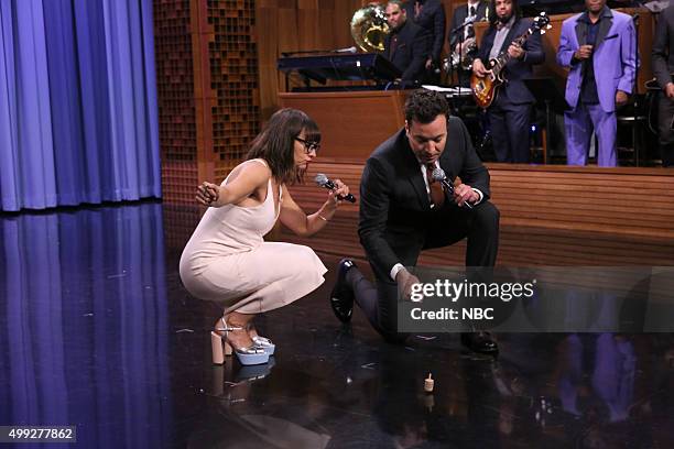 Episode 0376 -- Pictured: Actress Rashida Jones and host Jimmy Fallon sing a Holiday Medley on November 26, 2015 --