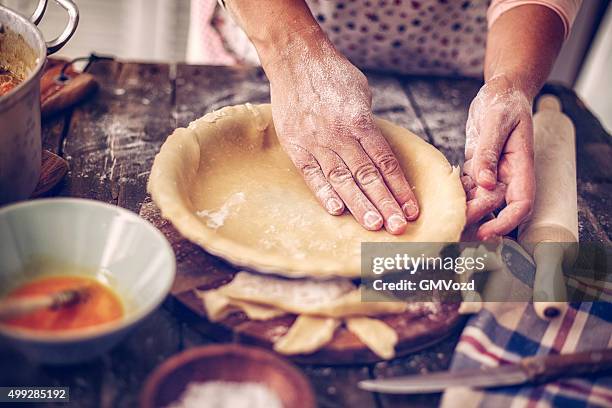 preparing delicious homemade chicken meat pie - savory pie stockfoto's en -beelden