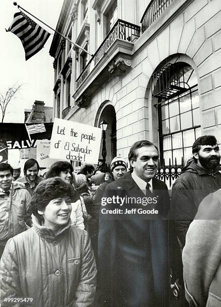 Ed joins protest; NDP Leader Ed Broadbent; centre; was among 400 protesters who marched in front of the U.S. Embassy in Ottawa yesterday to protest...