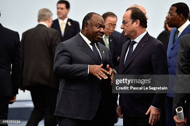 President of Congo Ali Bongo Ondimba and French President Francois Hollande attend the family photo session of the Cop 21 on November 30, 2015 in...