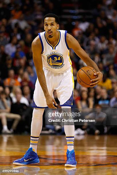 Shaun Livingston of the Golden State Warriors handles the ball during the NBA game against the Phoenix Suns at Talking Stick Resort Arena on November...