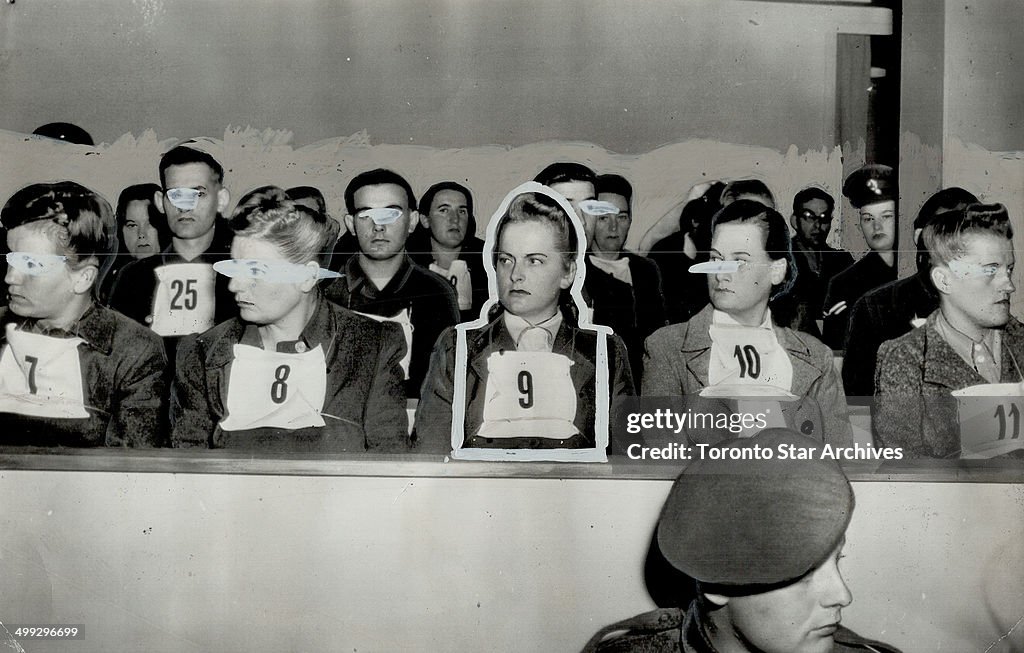 Women War Criminals on trial with other Nazis at Lueneberg; Germany; sit in the prisoners dock; wear...