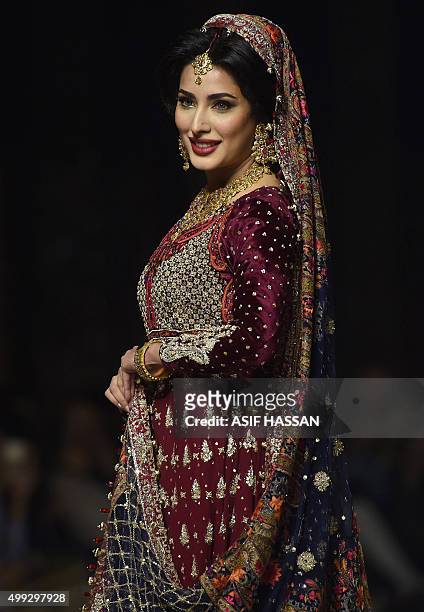 Model presents a creation by Pakistani designer Zainab Chottani on the final day of the Fashion Pakistan Week in Karachi on November 30, 2015. AFP...
