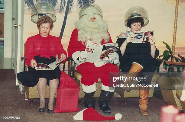 It's almost time for his annual outing; so Santa got his hair done yesterday at - where else? - Santo's unisex beauty salon on St. Clair Ave. W. And...