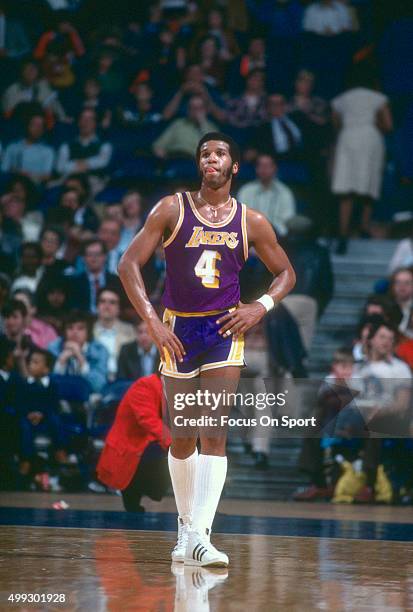 Adrian Dantley of the Los Angeles Lakers looks on against the Washington Bullets during an NBA basketball game circa 1978 at the Capital Centre in...