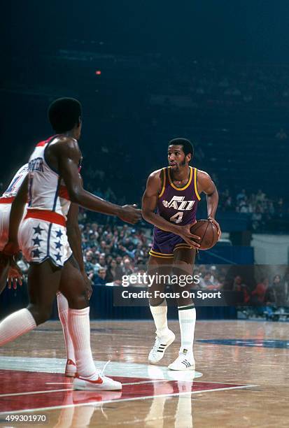 Adrian Dantley of the Utah Jazz looks to pass the ball against the Washington Bullets during an NBA basketball game circa 1979 at the Capital Centre...