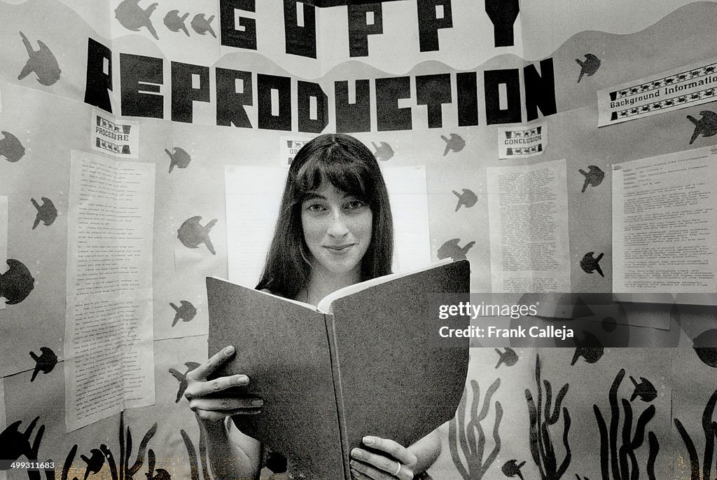 Guppy puppies: Rebecca Sikkema; 16; of Acton High School; checks over her award-winning science stud...