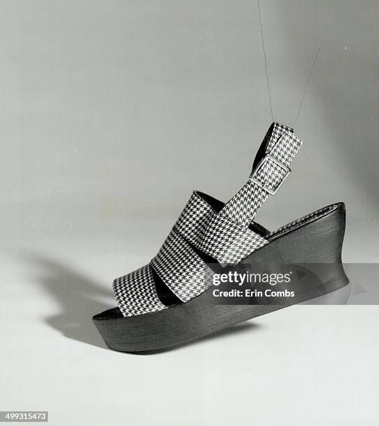 Below; houndstooth sandal with wedge sole; $68; Town Shoes.