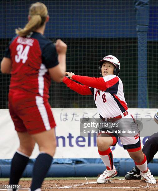 Megu Hirose of Japan hits a two-run homer in the top of first inning during the Japan Cup International Women's Softball Championship round robin...