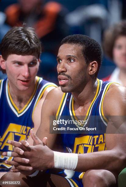 Adrian Dantley of the Utah Jazz looks on from the bench against the Washington Bullets during an NBA basketball game circa 1984 at the Capital Centre...