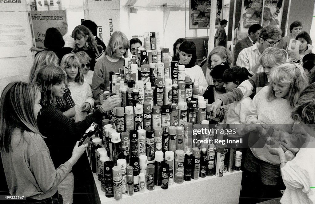 Ozone friendly: Students at the Ontario Science Centre Check an exhibit of aerosol cans that don't c...