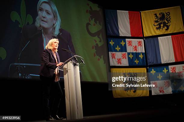 Marine Le Pen, leader of the French far-right National Front party, gives a speech during her campaign rally for the upcoming regional elections in...