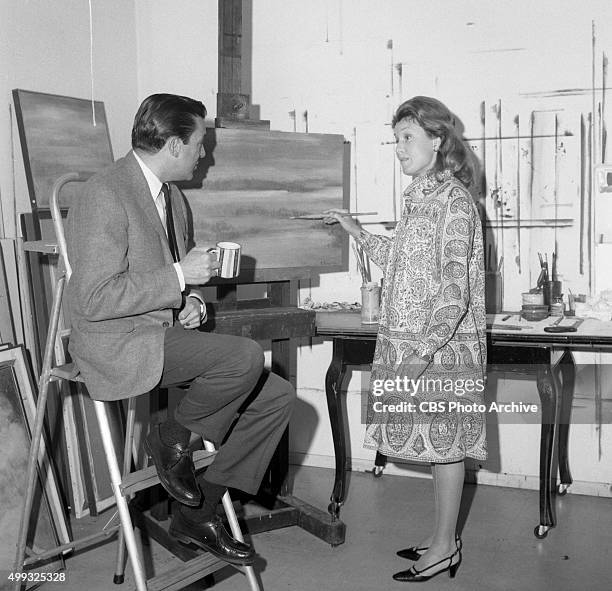 Mike Wallace with his third wife Lorraine Perigord at an art gallery. Image dated February 28, 1967. New York, NY