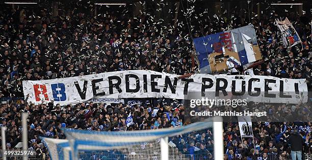 The fans of Karlsruhe protest with a banner against RB Leipzig during the Second Bundesliga match between Karlsruher SC and RB Leipzig at Wildpark...