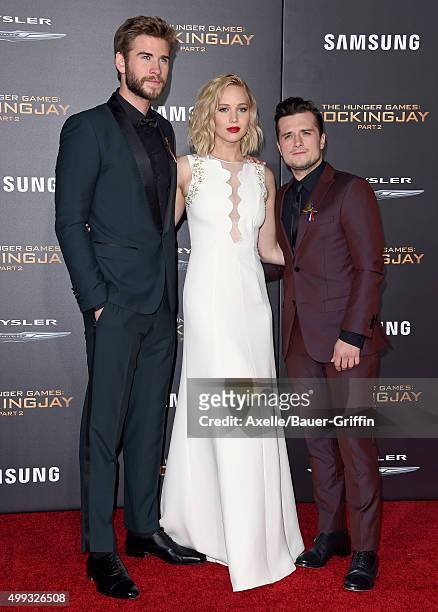 Actors Liam Hemsworth, Jennifer Lawrence and Josh Hutcherson arrive at the premiere of Lionsgate's 'The Hunger Games: Mockingjay - Part 2' at...