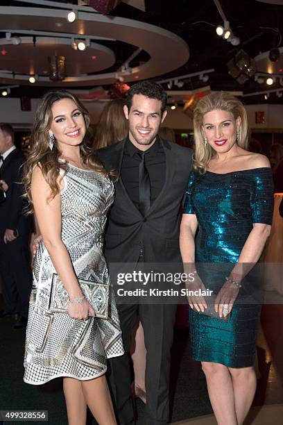 Kelly Brook, Jeremy Parisi and Hofit Golan attend the Eastern Seasons' Gala Dinner at Madame Tussauds on November 30 2015, in London, England.