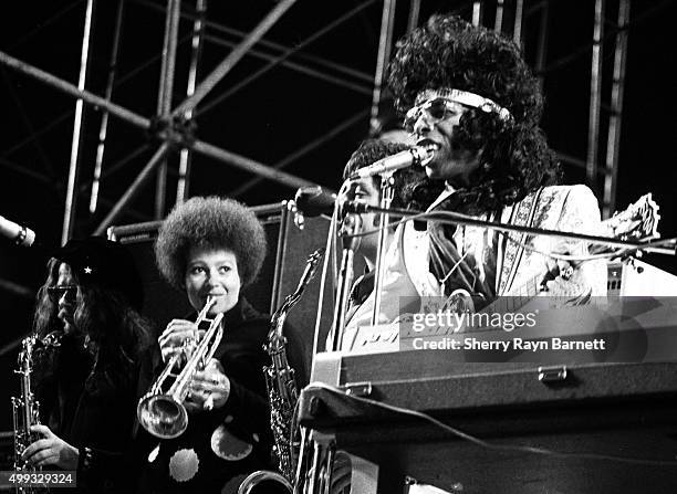 Jerry Martini, Cynthia Robinson and Sly Stone of the rock and roll group Sly And The Family Stone perform onstage at the Los Angeles Free Clinic...