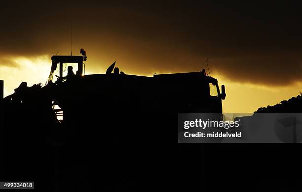 Contractor Loading 365 Contractor Loading Truck Stock Photos, High-Res Pictures, and ...