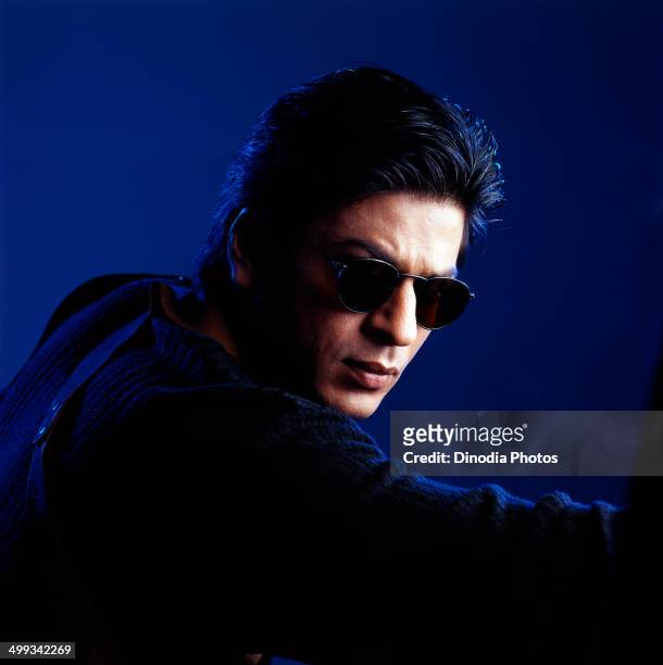 Indian actor, Shahrukh Khan wearing sunglasses, 2000.