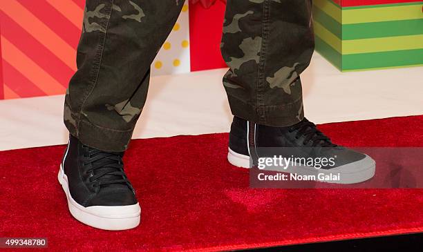 Singer Joe Jonas, shoe detail, attends JCPenney's #GIVETUESDAY with the Queens Boys & Girls Club at JCPenney Brooklyn Gateway on November 30, 2015 in...
