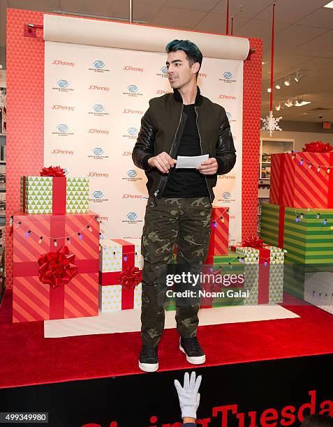 Singer Joe Jonas attends JCPenney's #GIVETUESDAY with the Queens Boys & Girls Club at JCPenney Brooklyn Gateway on November 30, 2015 in New York City.
