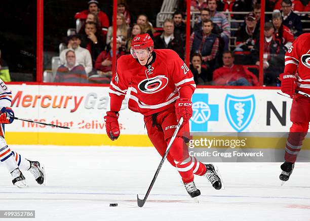 Riley Nash of the Carolina Hurricanes skates hard on the ice against the Edmonton Oilers during a NHL game at PNC Arena on November 25, 2015 in...