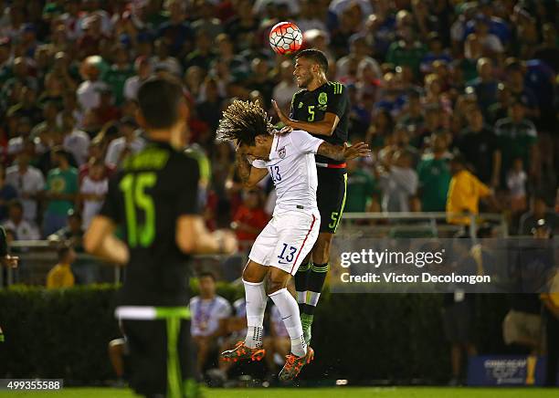 Jermaine Jones of the United States and Diego Reyes of Mexico vie for the ball during the 2017 FIFA Confederations Cup Qualifying match at Rose Bowl...