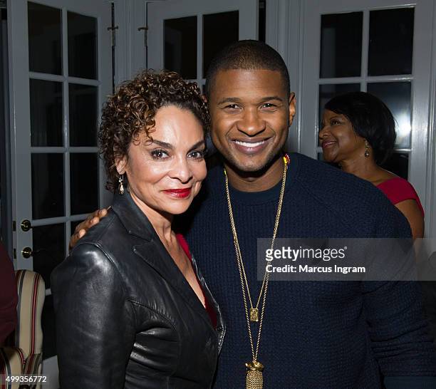 Actress Jasmine Guy and singer Usher attend an intimate gathering in honor of Norman Lear at Morehouse College on November 30, 2015 in Atlanta,...