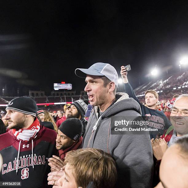 Ed McCaffrey, former Stanford and NFL wide receiver and father of Stanford's Christian McCaffrey joins the crowd on the field following the NCAA...