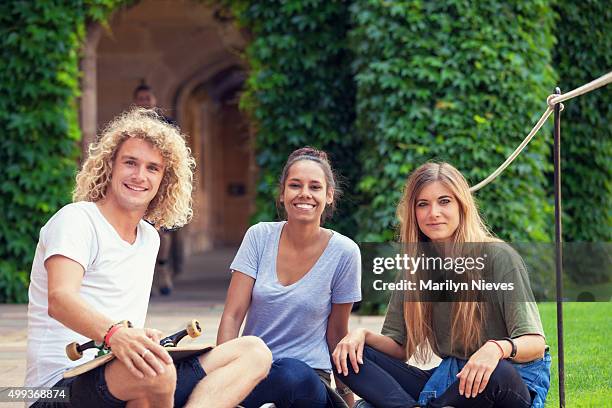 students smiling and looking at the camera - university student australia stock pictures, royalty-free photos & images