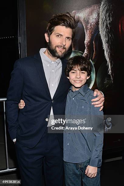 Adam Scott and Emjay Anthony attend the Industry Screening of Universal Pictures' "Krampus" at ArcLight Cinemas on November 30, 2015 in Hollywood,...