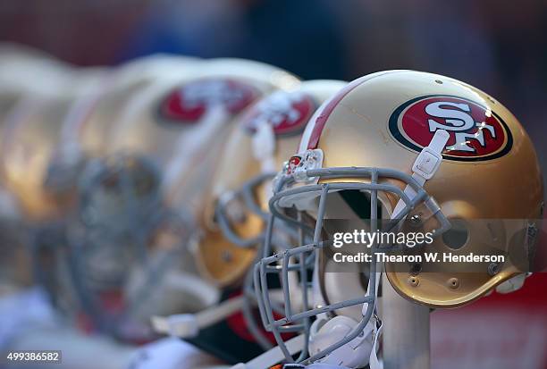 Detailed view of the San Francisco 49ers helmets on the bench during an NFL football game against the Arizona Cardinals at Levi's Stadium on November...