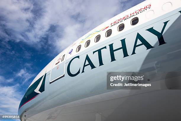 cathay pacific airways - cathay pacific stock pictures, royalty-free photos & images