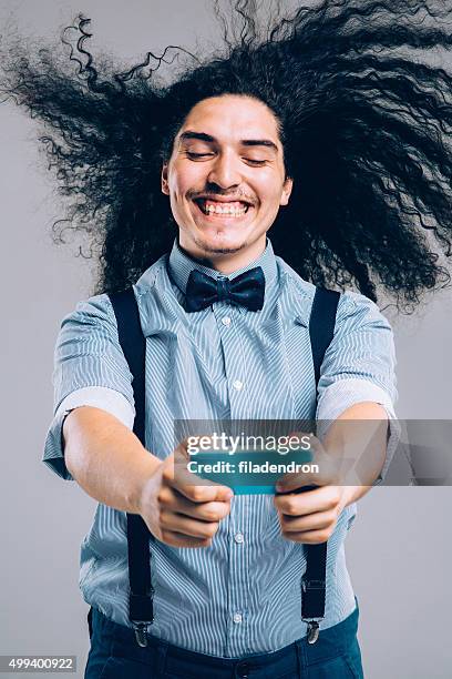 fast internet - tousled hair man stock pictures, royalty-free photos & images