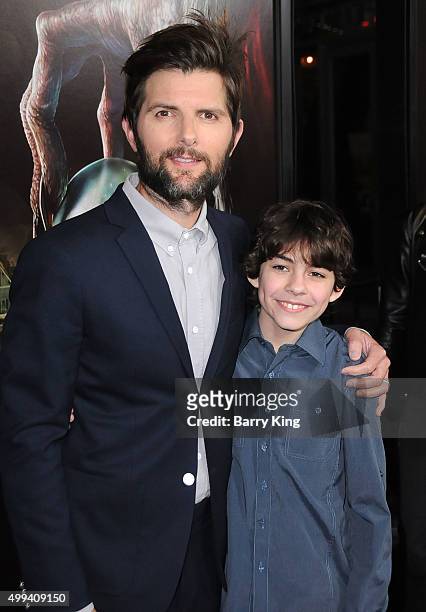 Actors Adam Scott and Emjay Anthony attend industry screening of Universal Pictures' 'Krampus' at ArcLight Cinemas on November 30, 2015 in Hollywood,...