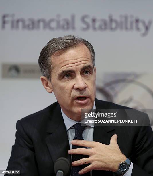 Bank of England governor Mark Carney takes part in a press conference at the Bank of England in London on December 1, 2015. Britain's seven top...