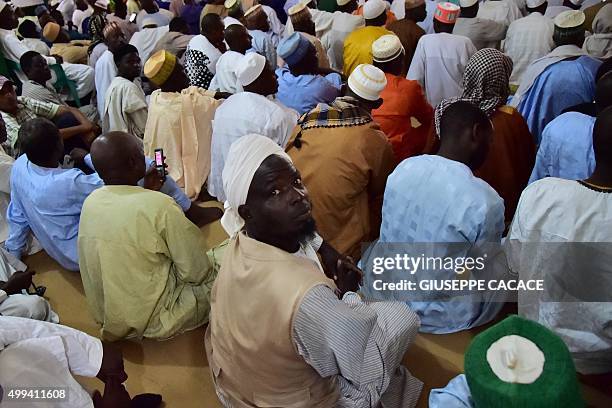 Men gather in the Bangui's Mosque before the arrival of the Pope Francis for a visit on November 30, 2015 as part of his papal trip to Africa. Pope...