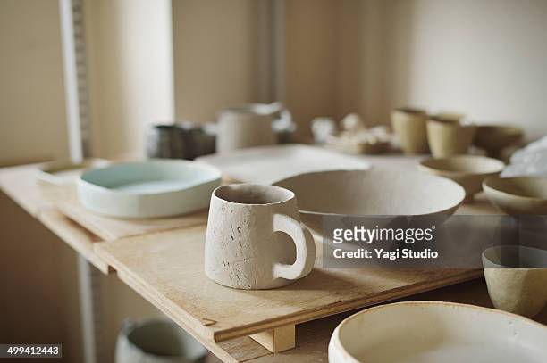 handmade ceramic works in studio - ceramic imagens e fotografias de stock