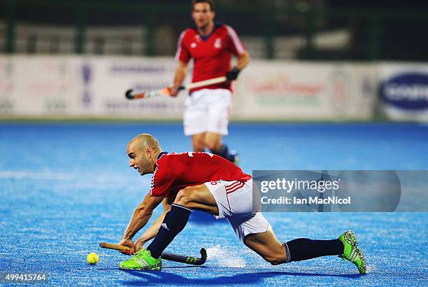 Nick Catlin of Great Britain shoots at goal during the match between Great Britain and Belgium on day five of The Hero Hockey League World Final at...