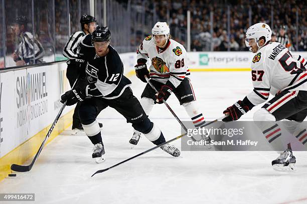 Patrick Kane of the Chicago Blackhawks and Trevor van Riemsdyk of the Chicago Blackhawks defend against Marian Gaborik of the Los Angeles Kings...