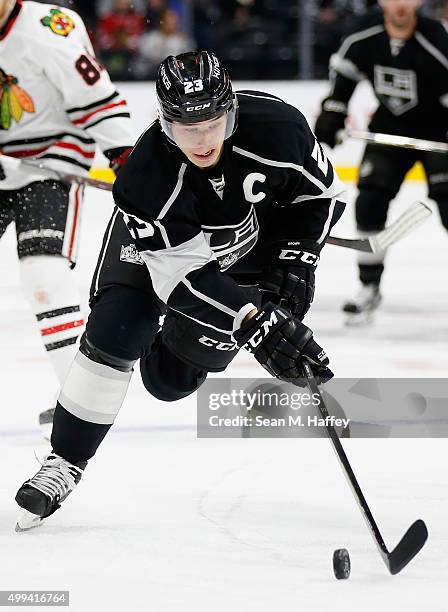 Dustin Brown of the Los Angeles Kings skates with the puck during a game against the Chicago Blackhawks at Staples Center on November 28, 2015 in Los...