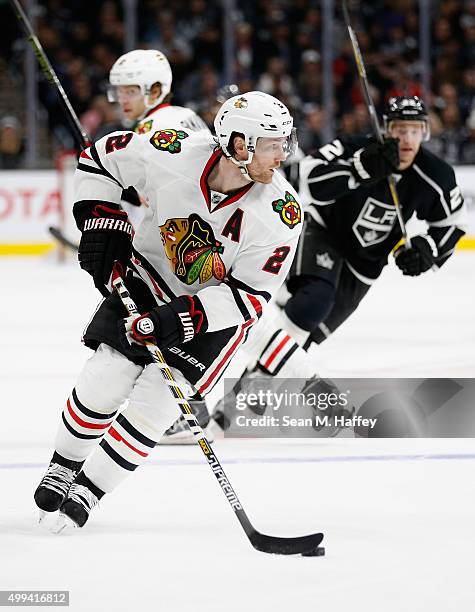 Duncan Keith of the Chicago Blackhawks skates with the puck during a game against the Los Angeles Kings at Staples Center on November 28, 2015 in Los...