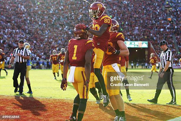 The USC Trojans celebrate after Darreus Rogers of the USC Trojans scores a touch down against the UCLA Bruins a 40-21 Trojan win in a NCAA PAC12...