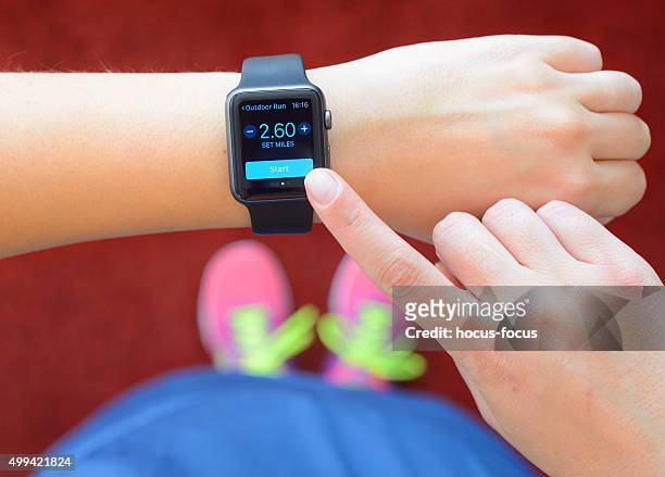 running with apple watch - apple watch heart stock pictures, royalty-free photos & images