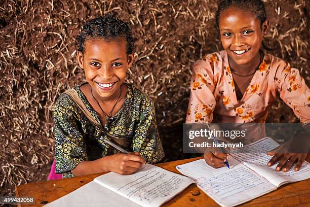 african little girls are learning amharic language - ethiopian ethnicity stock pictures, royalty-free photos & images