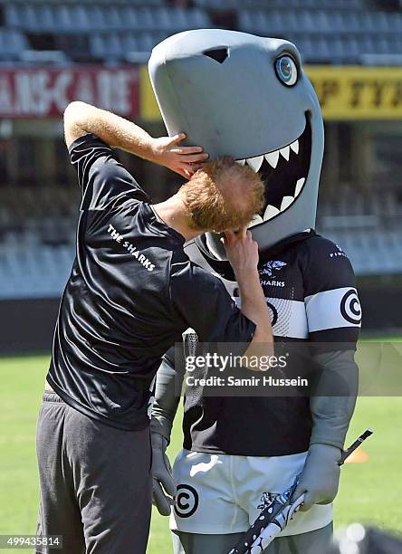 Prince Harry jokes around the mascot of The Sharks rugby club at Kings Park Stadium during an official visit to Africa on December 1, 2015 in Durban,...