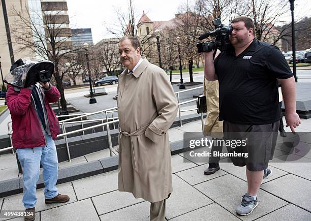 Donald "Don" Blankenship, former chief executive officer of Massey Energy Co., center, arrives at the Robert C. Byrd U.S. Courthouse in Charleston,...