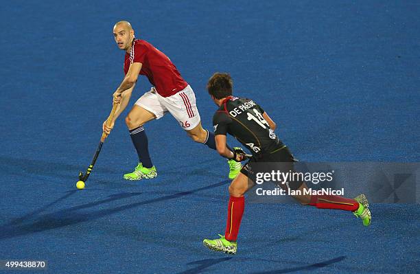 Nick Catlin of Great Britain runs with the ball during the match between Great Britain and Belgium on day five of The Hero Hockey League World Final...