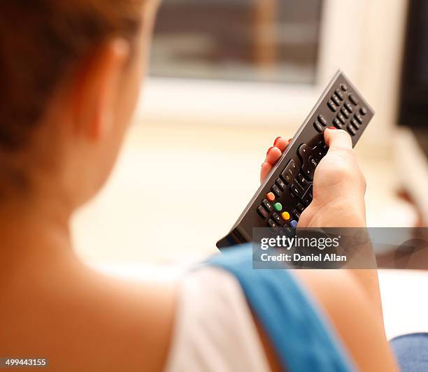 Someone Hoding A Remote 408 Black Hand Holding Remote Stock Photos, High-Res Pictures, and ...