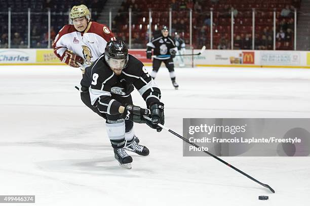 Yan Pavel Laplante of the Gatineau Olympiques controls the puck against the Acadie-Bathurst Titan on November 25, 2015 at Robert Guertin Arena in...